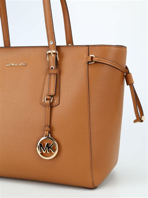 michael michael kors voyager medium leather tote|michael kors voyager large tote.